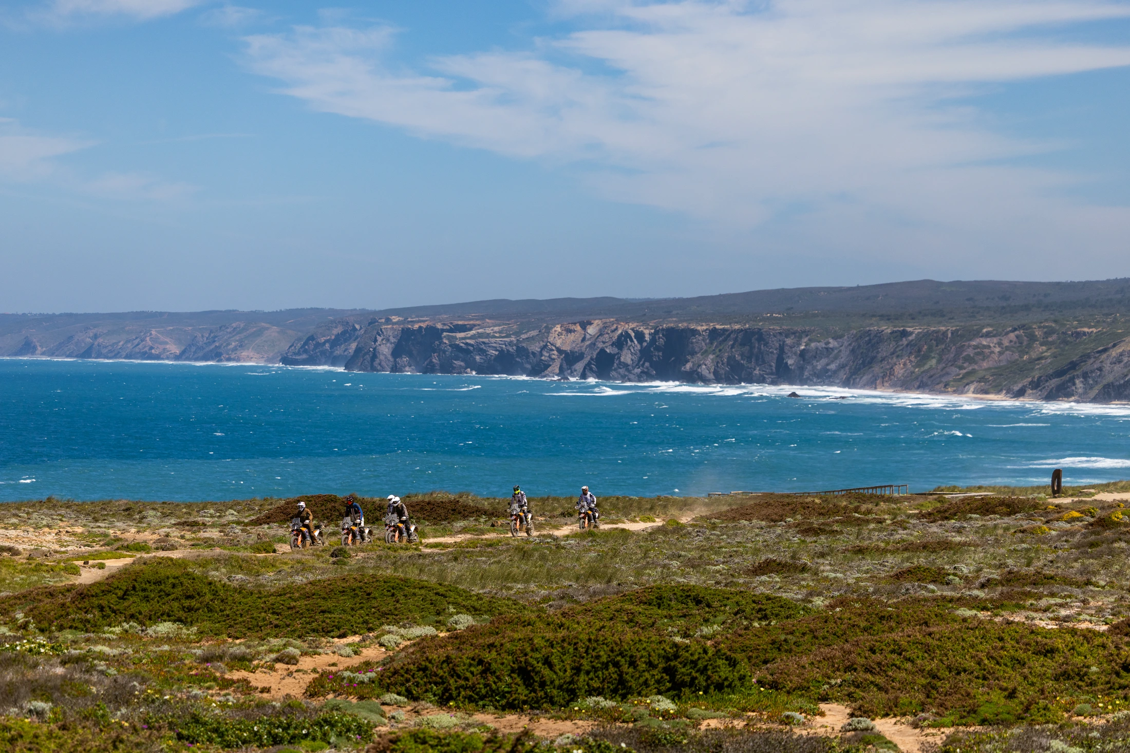 Riders on a clifftop track above the Atlantic in the western Algarve